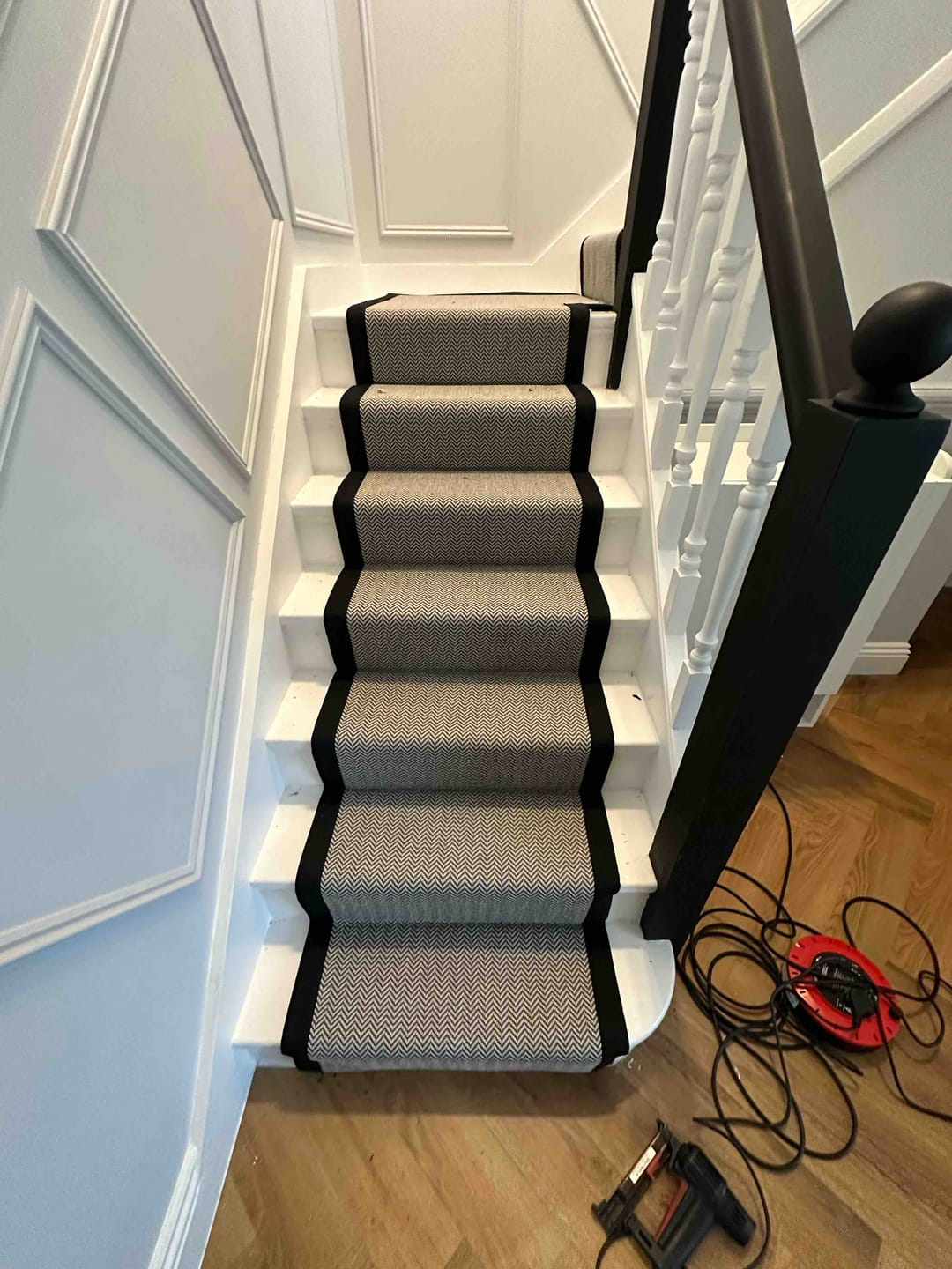 black herringbone faux sisal runner with black border