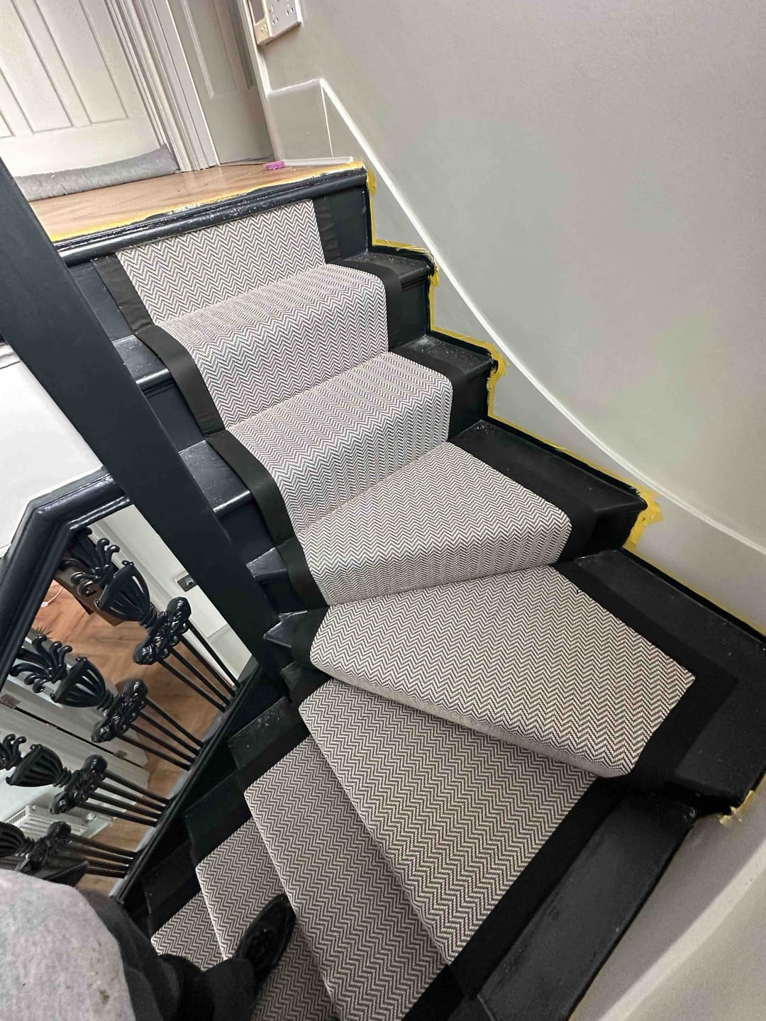 Faux sisal runner on stairs