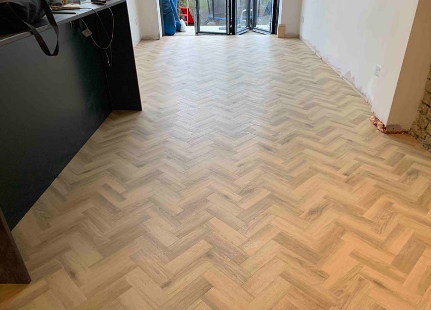 Herringbone parquet LVT floor