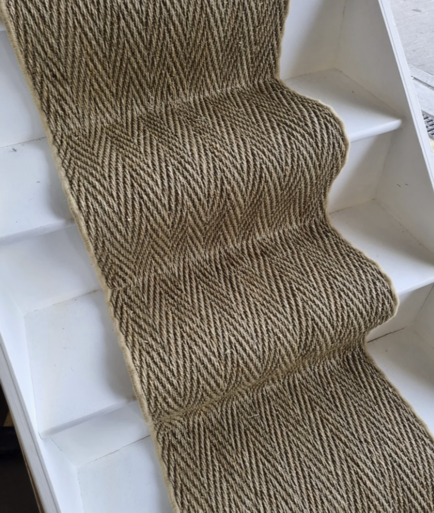 Seagrass herringbone pattern with a whipped edge