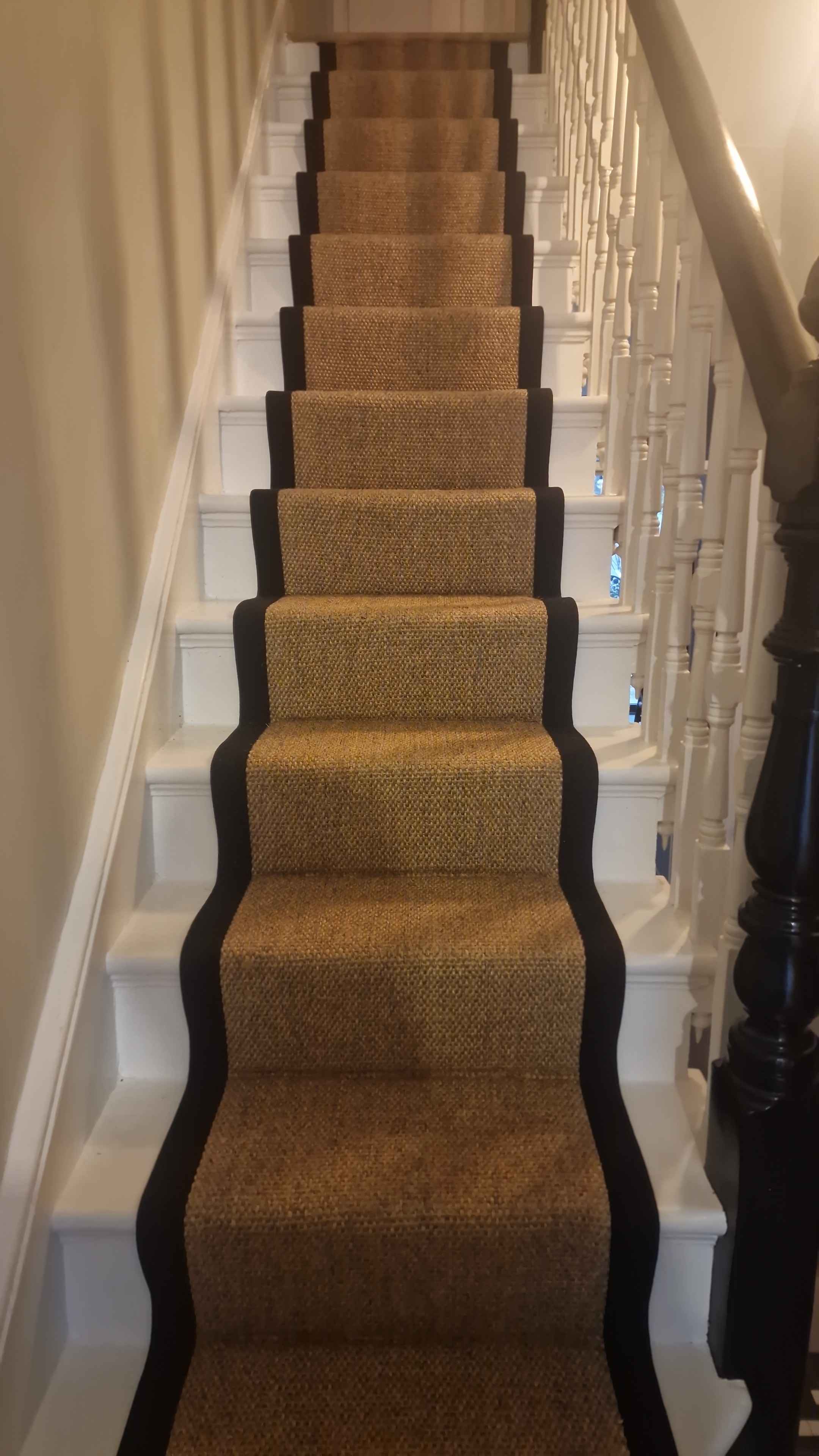 Sisal bouclé stair runner with a black cotton border
